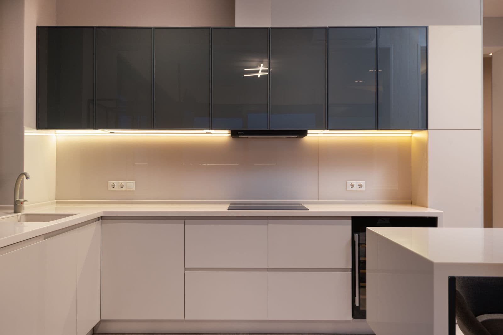 After: Clean, modern kitchen with light cabinets